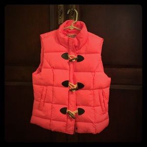 Bright pink puffer vest